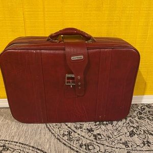 Vintage red World Traveler luggage